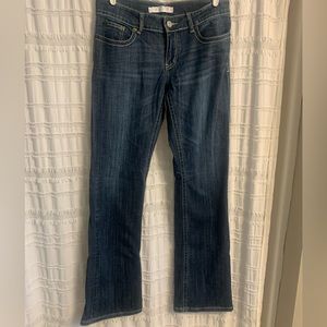 Women’s Tin Haul jeans, dark wash.  31 waist, XL length